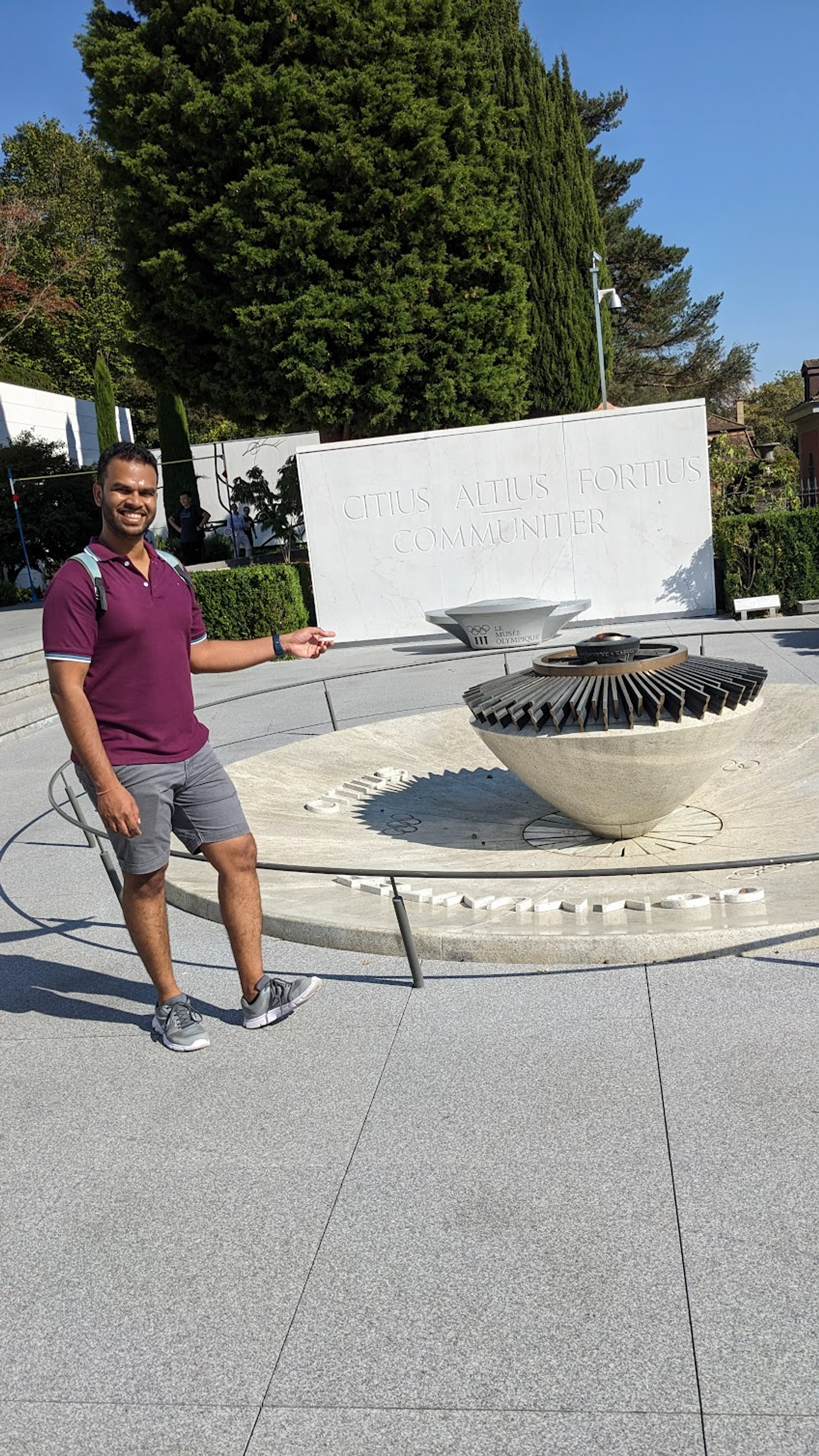 Me posing in front of the Olympic flame