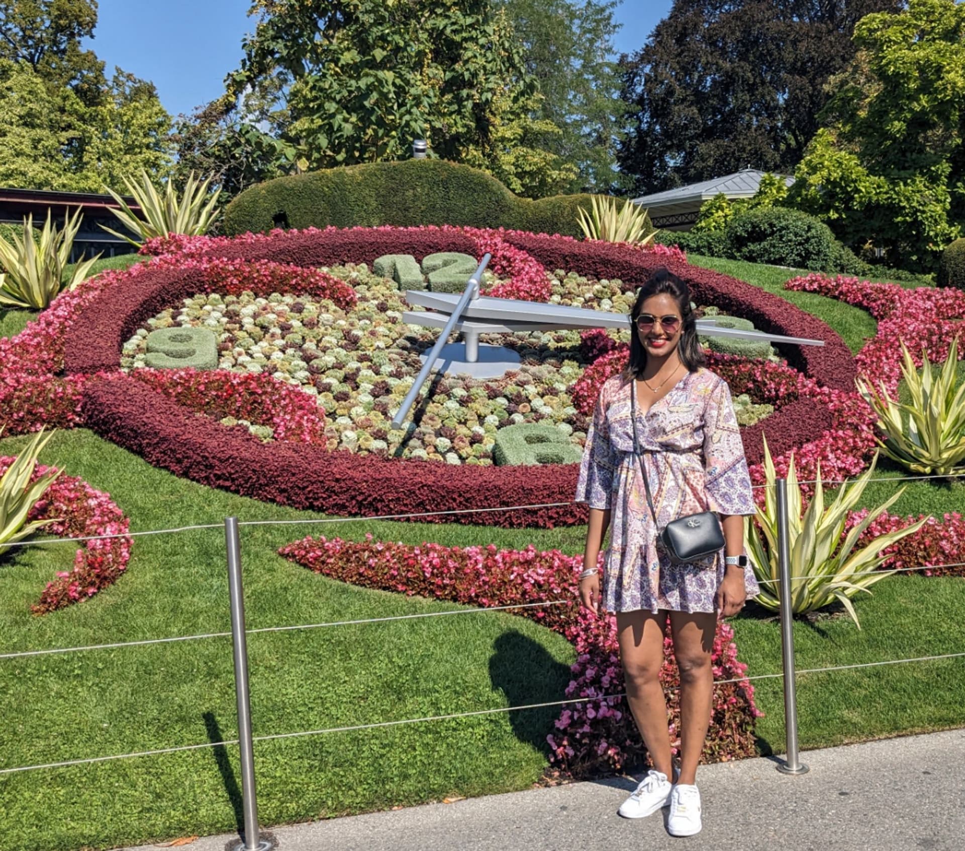 Dana infront of the Jardin Anglais Flower Clock